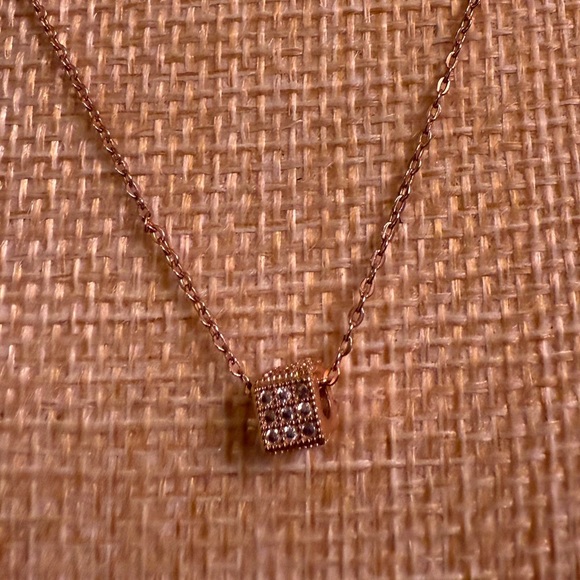 Dainty rose gold dice necklace with sparkly stones - Picture 4 of 6